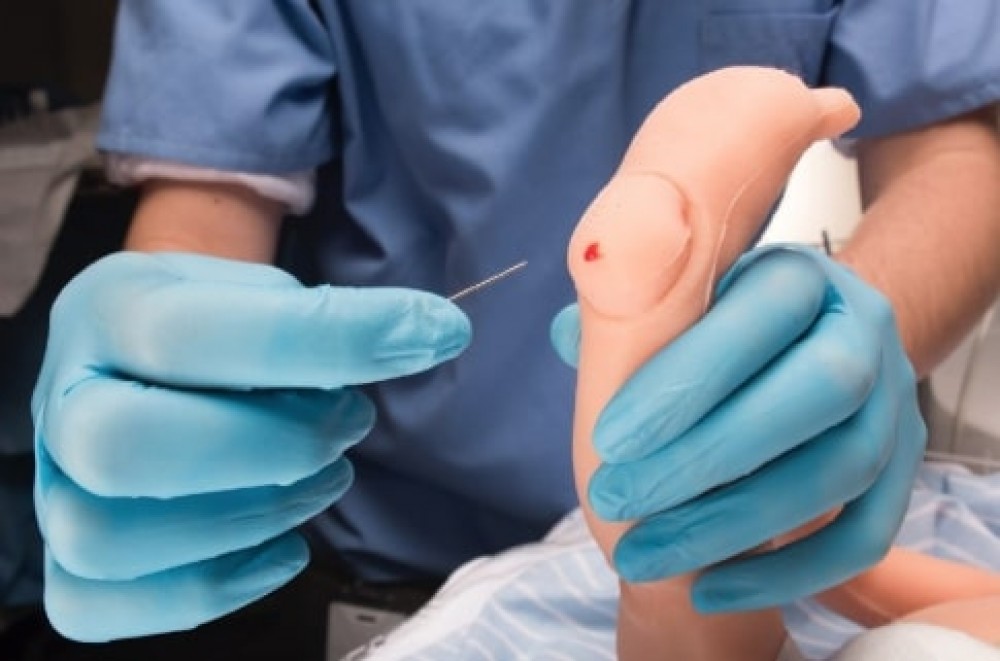 Base ajustable para valvula aortica